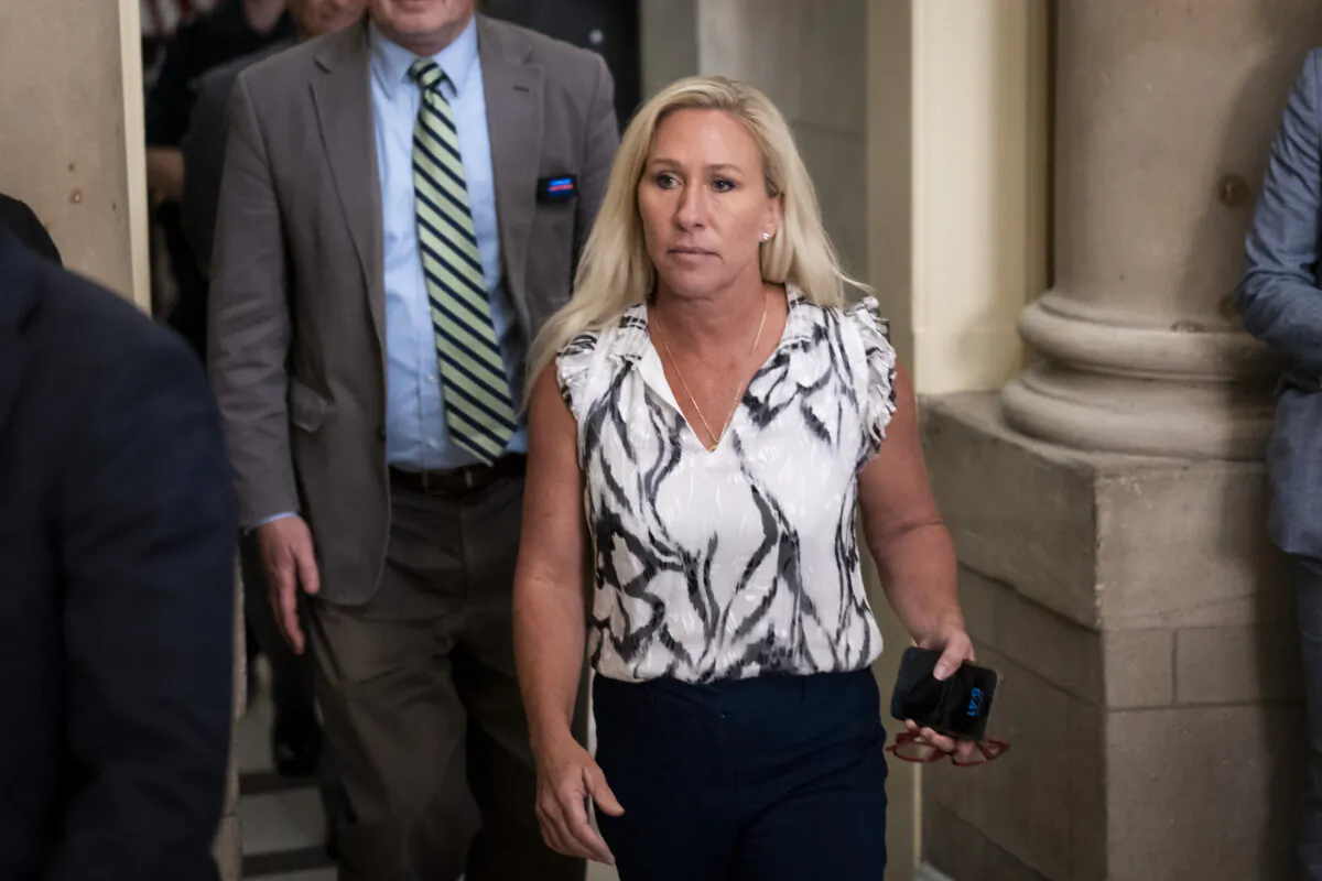 Rep. Marjorie Taylor Greene (R-Ga.) walks out of House Speaker Mike Johnson's (R-La.) office after a meeting in Washington on May 6, 2024. (Madalina Vasiliu/The Epoch Times)