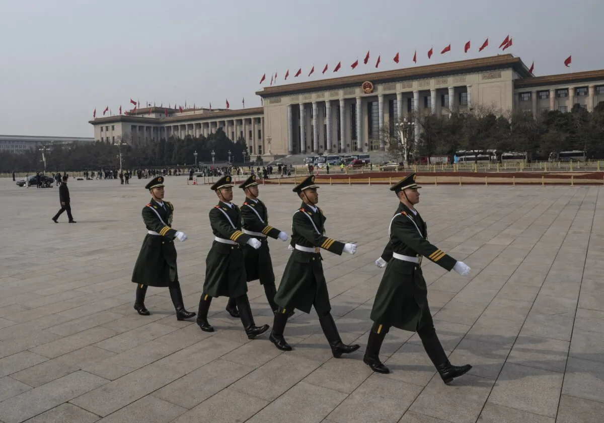 Members of a Peoples Liberation Army honour guard march in Tiananmen Square on March 10, 2024 in Beijing, China. (Kevin Frayer/Getty Images)