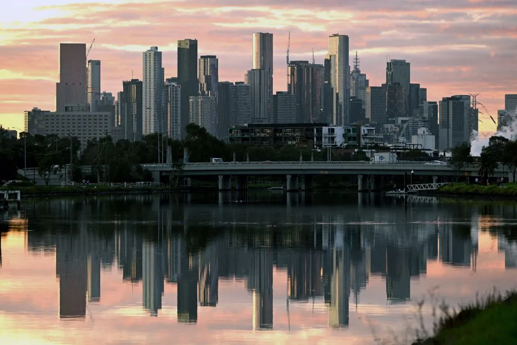The Melbourne skyline in reflected in the Maribyrnong River in the early morning light on April 18, 2023. - Melbourne has officially become Australia's most populous city after an adjustment to the city boundaries which saw its population jump to 4,875,400, almost 19,000 more than Sydney, according to Australia's Bureau of Statistics. (Photo by William WEST / AFP) (Photo by WILLIAM WEST/AFP via Getty Images)