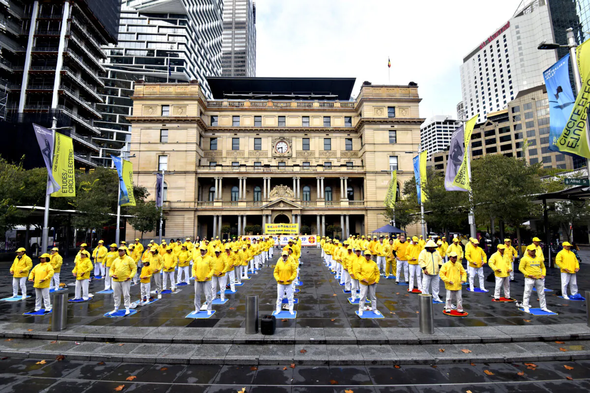 Practitioners of meditation practice Falun Dafa commemorating 'World Falun Dafa Day' in Sydney, Australia on May 6, 2024. (The Epoch Times)