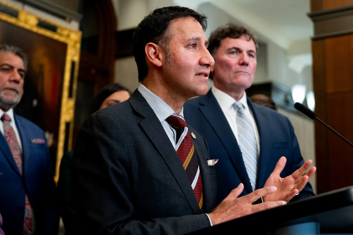 Arif Virani, Minister of Justice and Attorney General speaks in the Foyer of the House of Commons on Parliament Hill in Ottawa, on May 6, 2024. (The Canadian Press/Spencer Colby)
