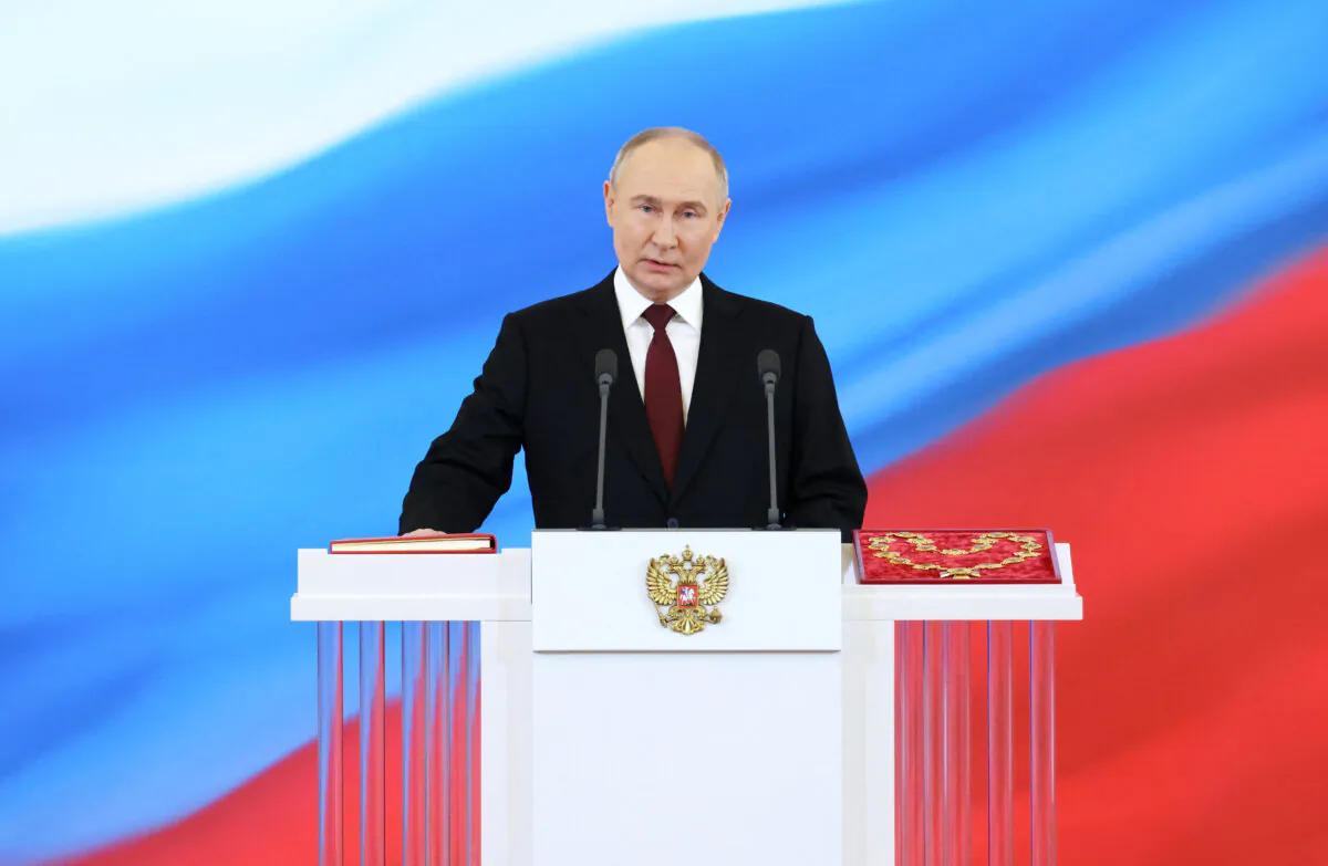 Russian president-elect Vladimir Putin takes the oath of office during a ceremony at the Kremlin in Moscow on May 7, 2024. (Alexander Kazakov/Pool/AFP via Getty Images)