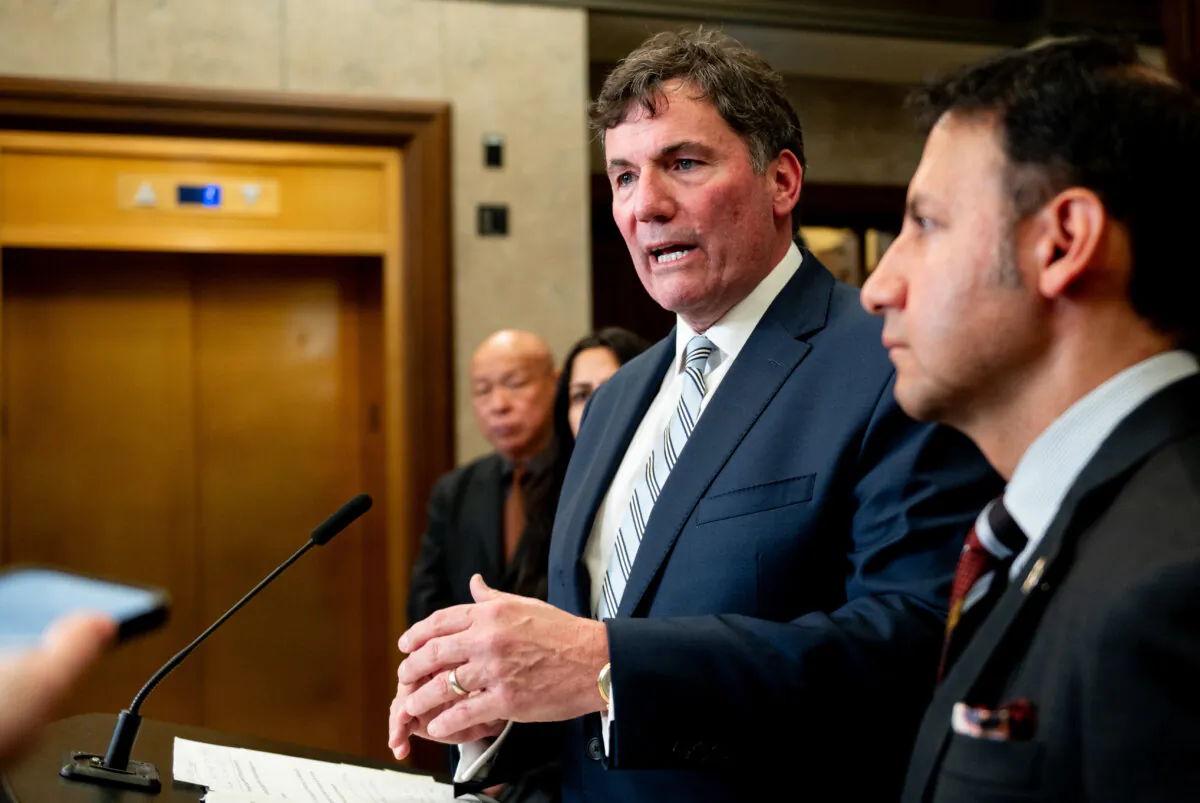 Public Safety Minister Dominic LeBlanc speaks to reporters in the foyer of the House of Commons May 6, 2024, announcing newly proposed legislation aimed at countering foreign interference in Canada. (The Canadian Press/Spencer Colby)
