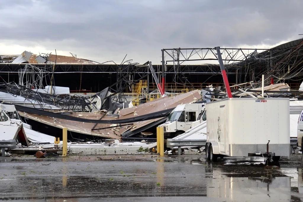 Debris is seen from a damaged FedEx facility after a tornado in Portage, Mich., on May 7, 2024. (Brad Devereaux/Kalamazoo Gazette via AP)