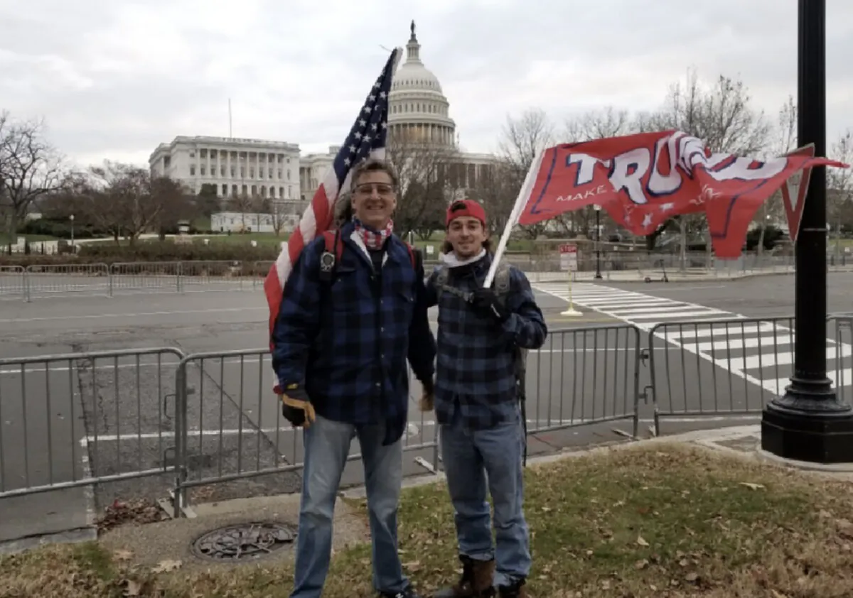 David K. Homol (L) of Umatilla, Fla., poses with his half-brother Dillon Homol (R) near the Capitol, on Jan. 6, 2021. (U.S. Department of Justice/Screenshot via The Epoch Times)
