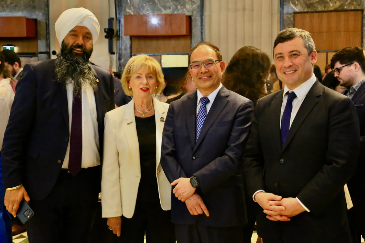 Taiwan's Representative in Canada Ho-jen Tseng (3rd L), poses with Liberal MPs Randeep Sarai (L) and Judy Sgro, and Conservative MP Michael Chong. They attended the "Taiwan Night" event held at the Sir John A Macdonald Building in Ottawa on May 7, 2024. (Donna He/The Epoch Times)
