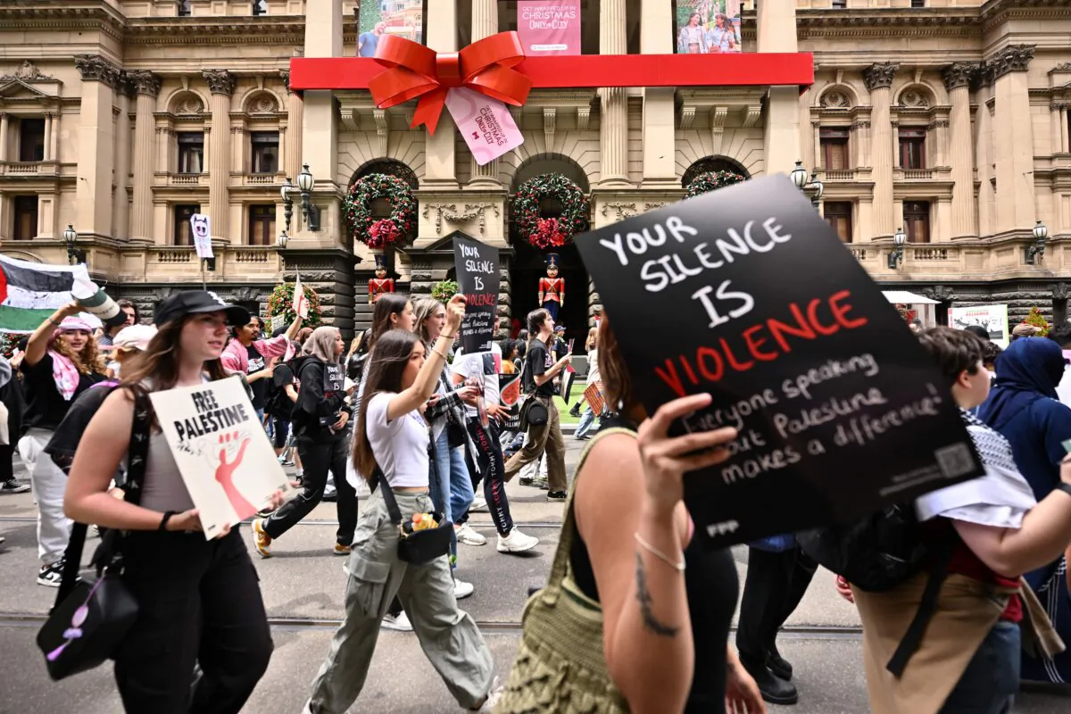 School students participate in a strike for Palestine in Melbourne, Australia, on Dec. 7, 2023. (AAP Image/Joel Carrett) 