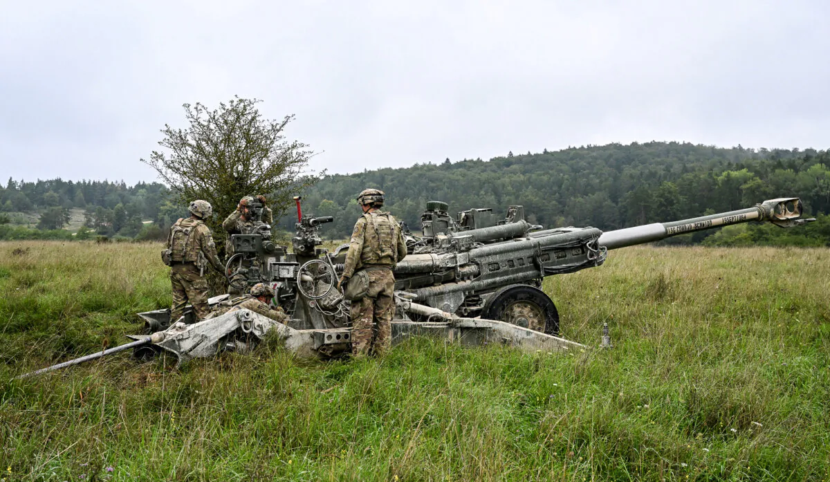 U.S. Soldiers of an artillery unit set up an artillery cannon during the NATO exercise 'Saber Junction 23' at the Hohenfels trainings area, southern Germany on Sept. 14, 2023. (Christof Stache/AFP via Getty Images)
