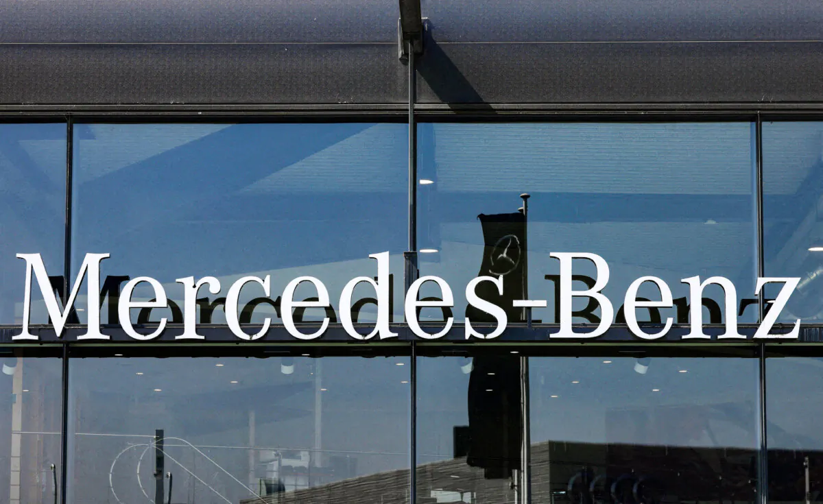 The logo of Mercedes-Benz outside a Mercedes-Benz car dealer in Brussels, on June 1, 2023. (Yves Herman/Reuters)