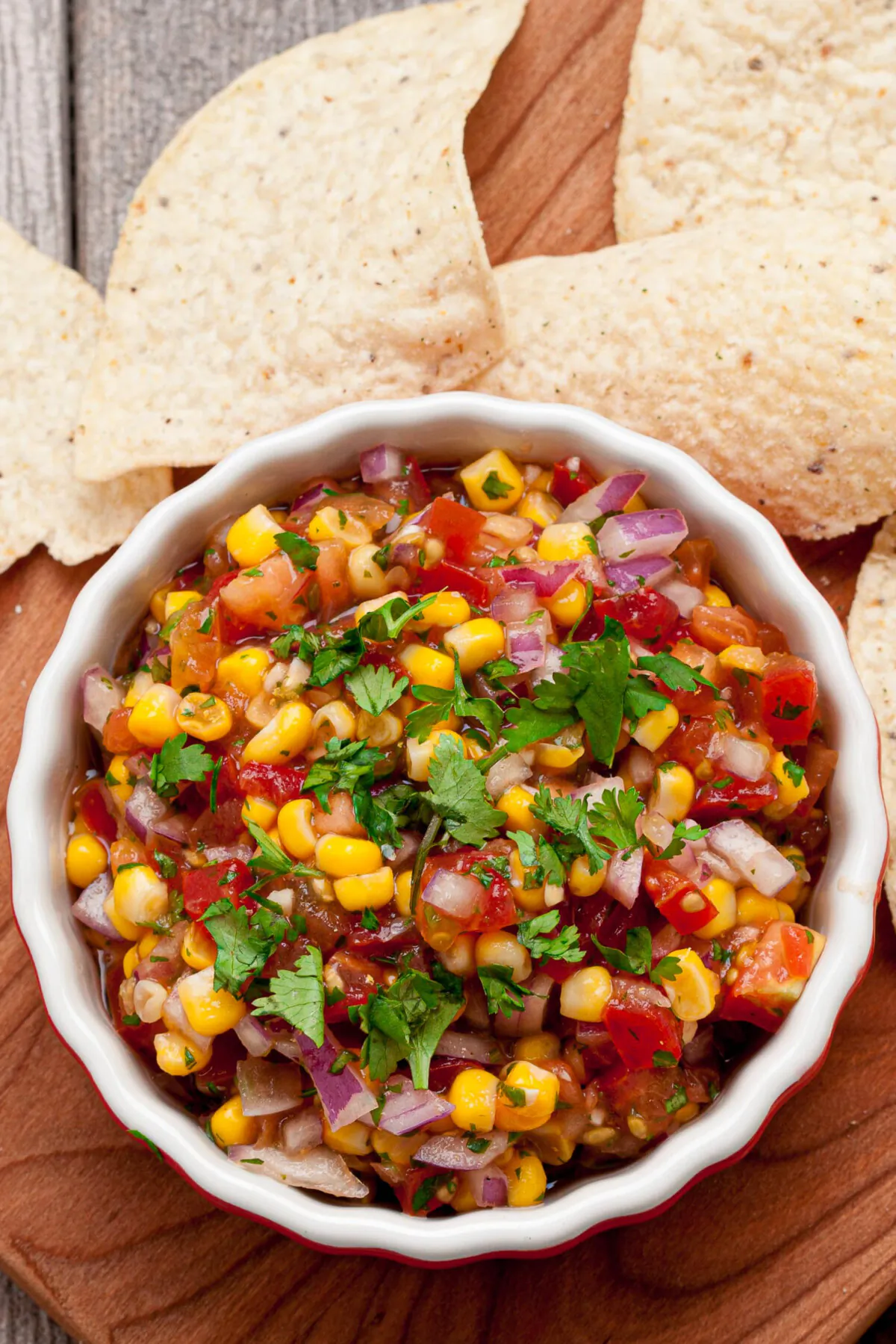 This Corn Salsa is bursting with fresh flavors, easy to pull together, and always a crowd-pleaser. Here's your next guilt-free snacking addiction! (Courtesy of Amy Dong)
