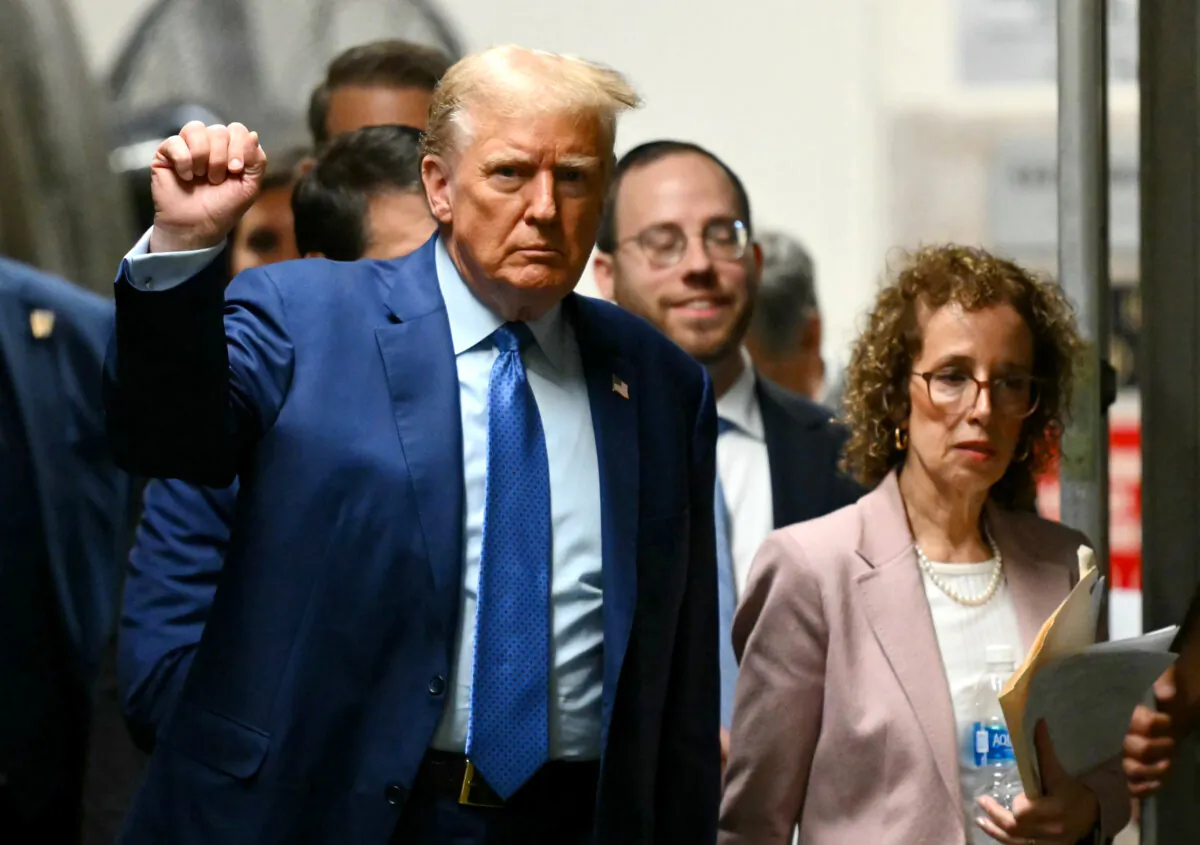 Former President Donald Trump and attorney Susan Necheles return from a break during his trial for allegedly covering up hush money payments at Manhattan Criminal Court in New York City on May 9, 2024. (Angela Weiss-Pool/Getty Images)