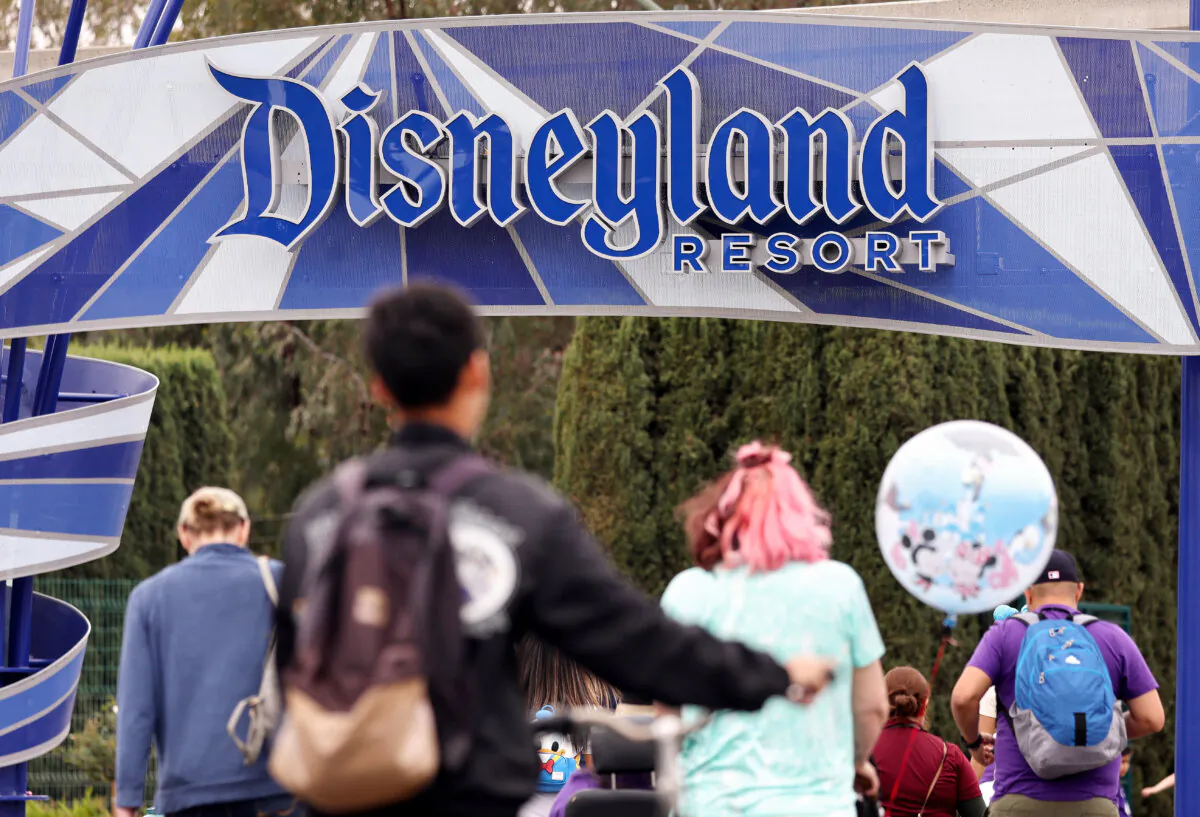 People enter Disneyland on April 24, 2023, in Anaheim, Calif. (Mario Tama/Getty Images)