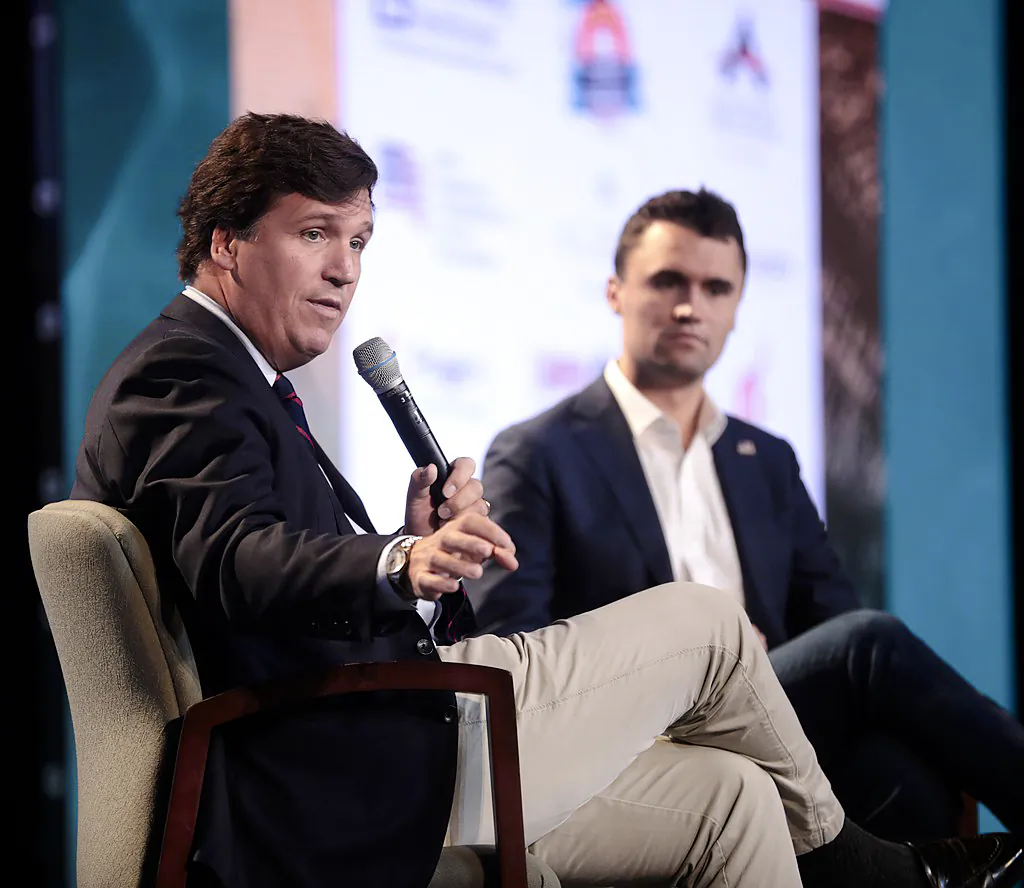 Tucker Carlson (L) with Charlie Kirk in 2018. (Gage Skidmore/CC BY-SA 2.0)