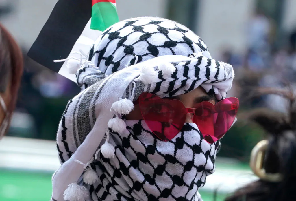 A pro-Palestinian protestor wears a keffiyeh on the West Lawn of Columbia University in New York on April 29, 2024. (Timothy A. Clary/AFP via Getty Images)
