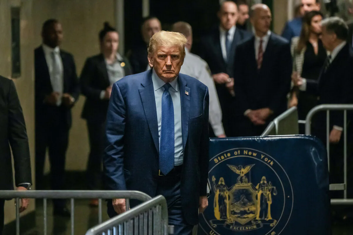 Former U.S. President Donald Trump walks toward the press to speak as he arrives for his trial for allegedly covering up hush money payments linked to extramarital affairs, at Manhattan Criminal Court in New York City, on May 9, 2024. (Victor J. Blue / POOL / AFP)