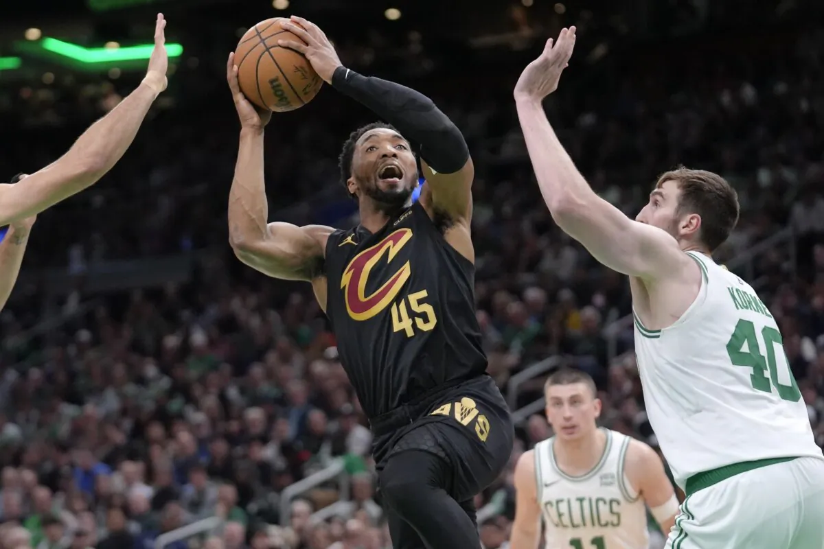Cleveland Cavaliers guard Donovan Mitchell (45) shoots as Boston Celtics center Luke Kornet (40) defends during the second half of Game 2 of an NBA basketball second-round playoff series in Boston on May 9, 2024. (Steven Senne/AP Photo)