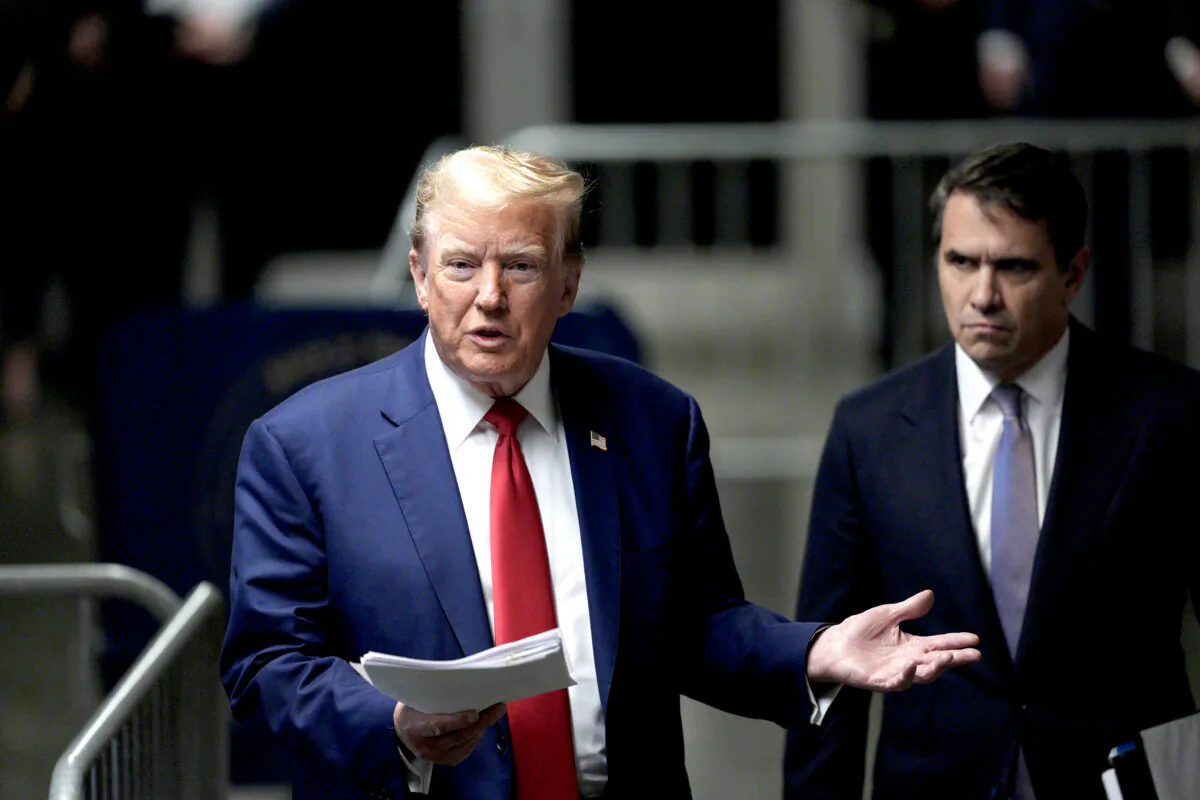 Former President Donald Trump, with attorney Todd Blanche (R), speaks to the press as he arrives for his criminal trial for allegedly covering up hush money payments at Manhattan Criminal Court in New York City on May 10, 2024. (Curtis Means-Pool/Getty Images)