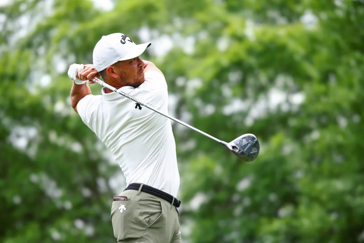 Xander Schauffele hits a tee shot on the third hole during the second round of the Wells Fargo Championship at Quail Hollow Country Club in Charlotte on May 10, 2024. (Jared C. Tilton/Getty Images)