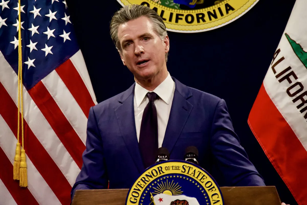 California Gov. Gavin Newsom announces billions of dollars in spending cuts during his May budget revision news conference at the Capitol in Sacramento on May 10, 2024. (Travis Gillmore/The Epoch Times)