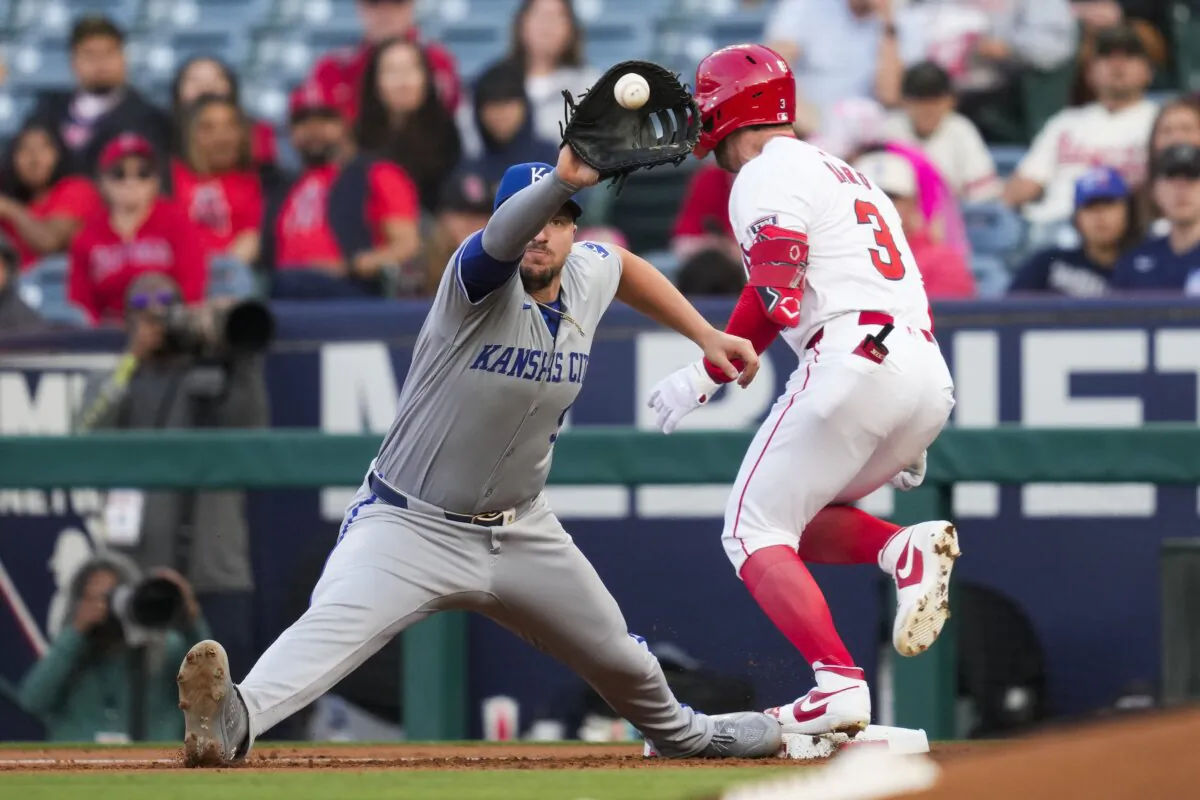 Los Angeles Angels' Taylor Ward (3) is safe at first ahead of a throw to Kansas City Royals first baseman Vinnie Pasquantino during the first inning of a baseball game in Anaheim, Calif., on May 10, 2024. (Ashley Landis/AP Photo)