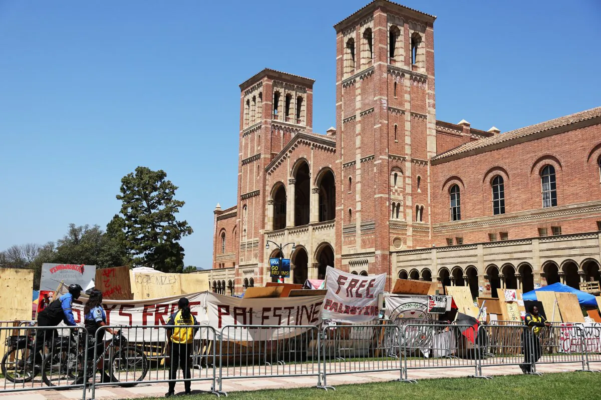 UCLA campus security gathers outside a pro-Palestinian encampment at the University of California, Los Angeles campus in Los Angeles, Calif., on April 30, 2024. (Mario Tama/Getty Images)