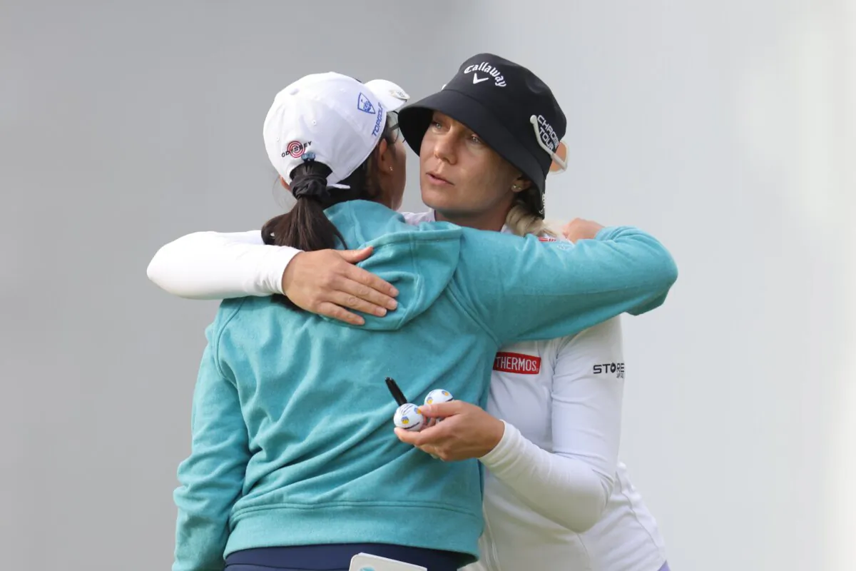 Rose Zhang of the United States and Madelene Sagstrom of Sweden embrace on the 18th green during the third round of the Cognizant Founders Cup at Upper Montclair Country Club in Clifton, N.J., on May 11, 2024. (Mike Stobe/Getty Images)