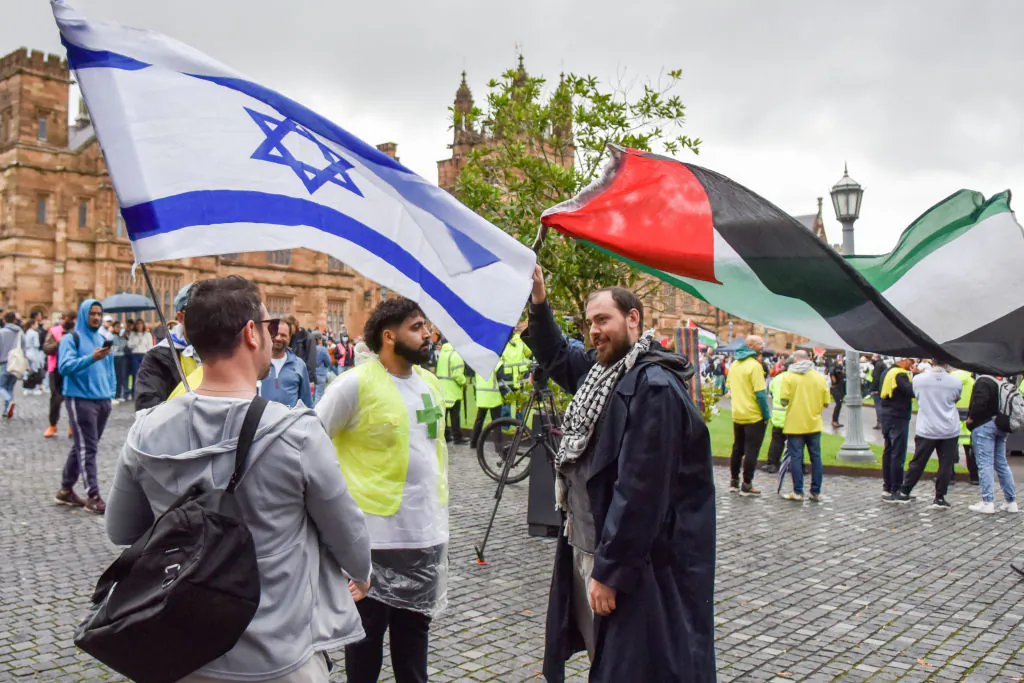 Members of the Australian Palestinian community and Australian Israeli members engage in dialogue at the Palestinian Protest Campsite at University of Sydney in Sydney, Australia, on May 3, 2024. (Photo by Ayush Kumar / AFP) (Photo by AYUSH KUMAR/AFP via Getty Images)