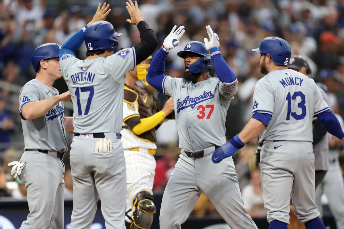 Will Smith (16), Max Muncy (13) and Shohei Ohtani (17) congratulate Teoscar Hernández (37) of the Los Angeles Dodgers after his grand-slam during the sixth inning of a game against the San Diego Padres in San Diego on May 11, 2024. (Sean M. Haffey/Getty Images)