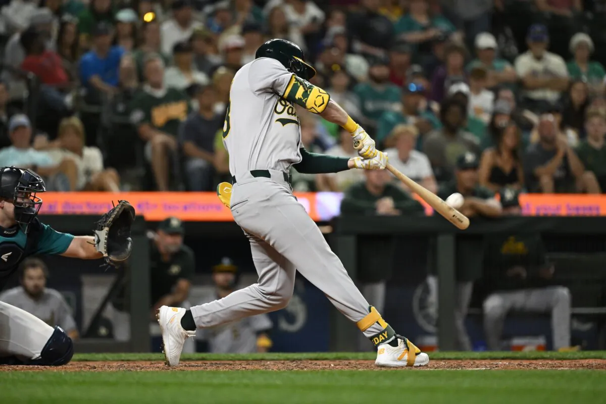 JJ Bleday (33) of the Oakland Athletics hits a two-run home run during the ninth inning against the Seattle Mariners in Seattle on May 11, 2024. (Alika Jenner/Getty Images)