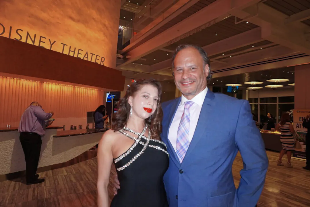 Vitiate Salas and Humberto Marrero enjoyed Shen Yun's evening performance at the Dr. Phillips Center for the Performing Arts on May 11, 2024. (Sally Sun/The Epoch Times)
