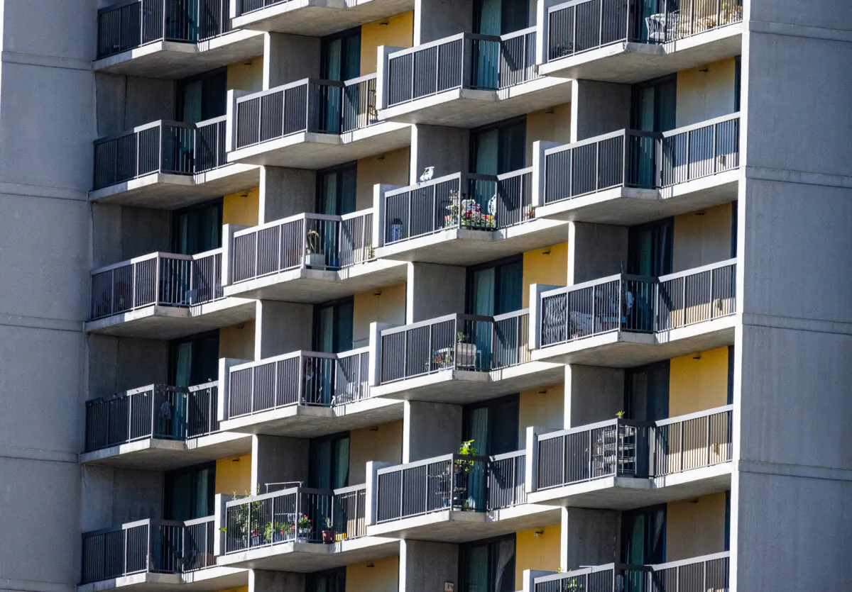 An apartment unit resides next to towering buildings in Los Angeles on Jan. 11, 2024. (John Fredricks/The Epoch Times)