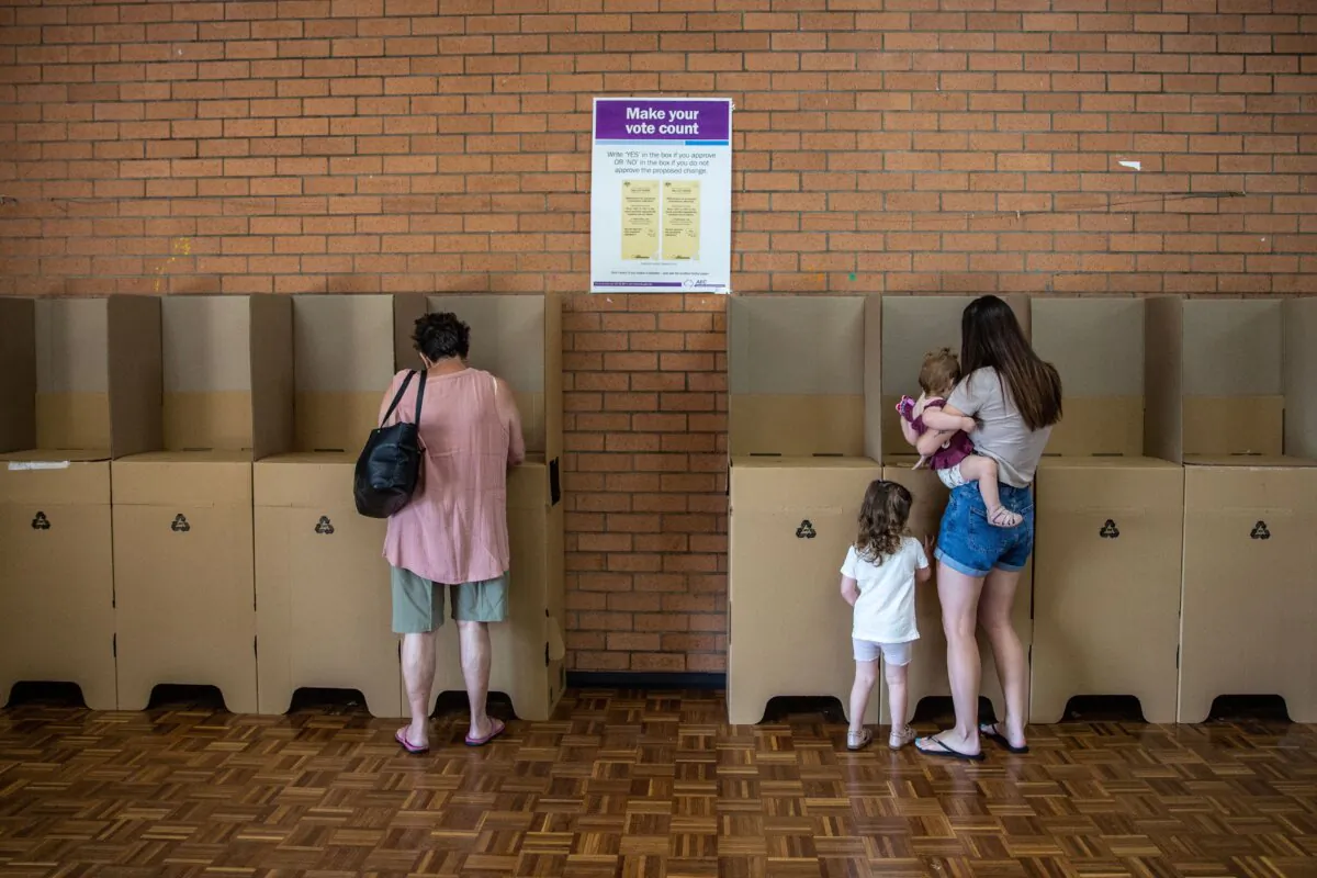 Voters cast their vote at a polling centre at Stan Thiess Memorial Center in Muswellbrook, Australia, on Oct. 14, 2023. (Roni Bintang/Getty Images)