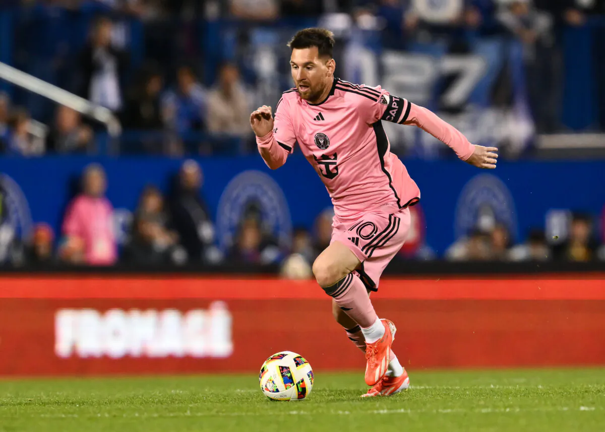 Lionel Messi #10 of Inter Miami runs the field with the ball during the second half against CF Montréal at Saputo Stadium in Montreal, Quebec, Canada on May 11, 2024. (Minas Panagiotakis/Getty Images)