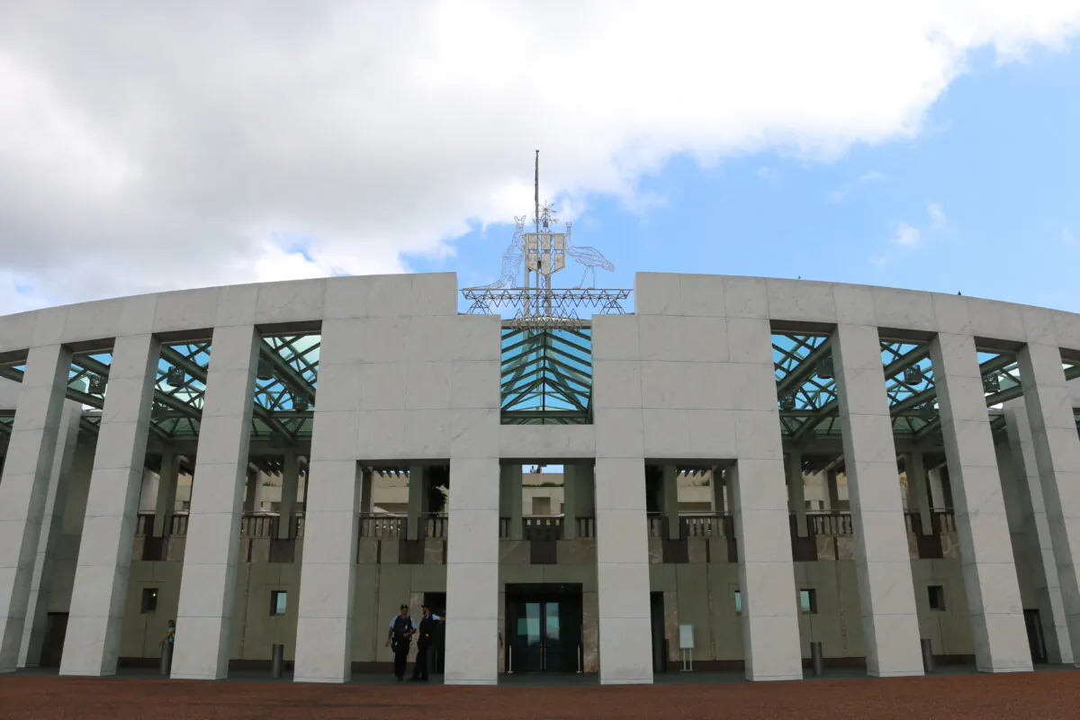 The Commonwealth Coat of Arms atop Parliament House in Canberra, Australia, on Feb. 8, 2024. (Melanie Sun/The Epoch Times)