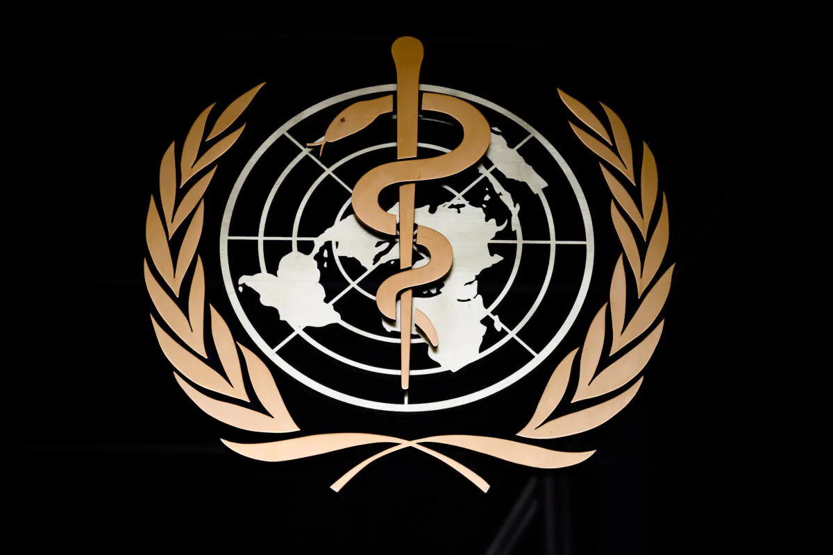 The World Health Organisation (WHO) logo is seen at the entrance of their headquarters in Geneva, Switzerland, on March 9, 2020. (Fabrice Coffrini/AFP via Getty Images)