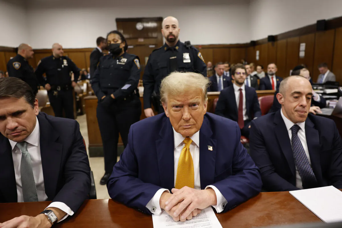 Former President Donald Trump (C) sits in the courtroom with attorneys Todd Blanche (L) and Emil Bove at Manhattan Criminal Court in New York City on May 14, 2024. (Michael M. Santiago/Getty Images)