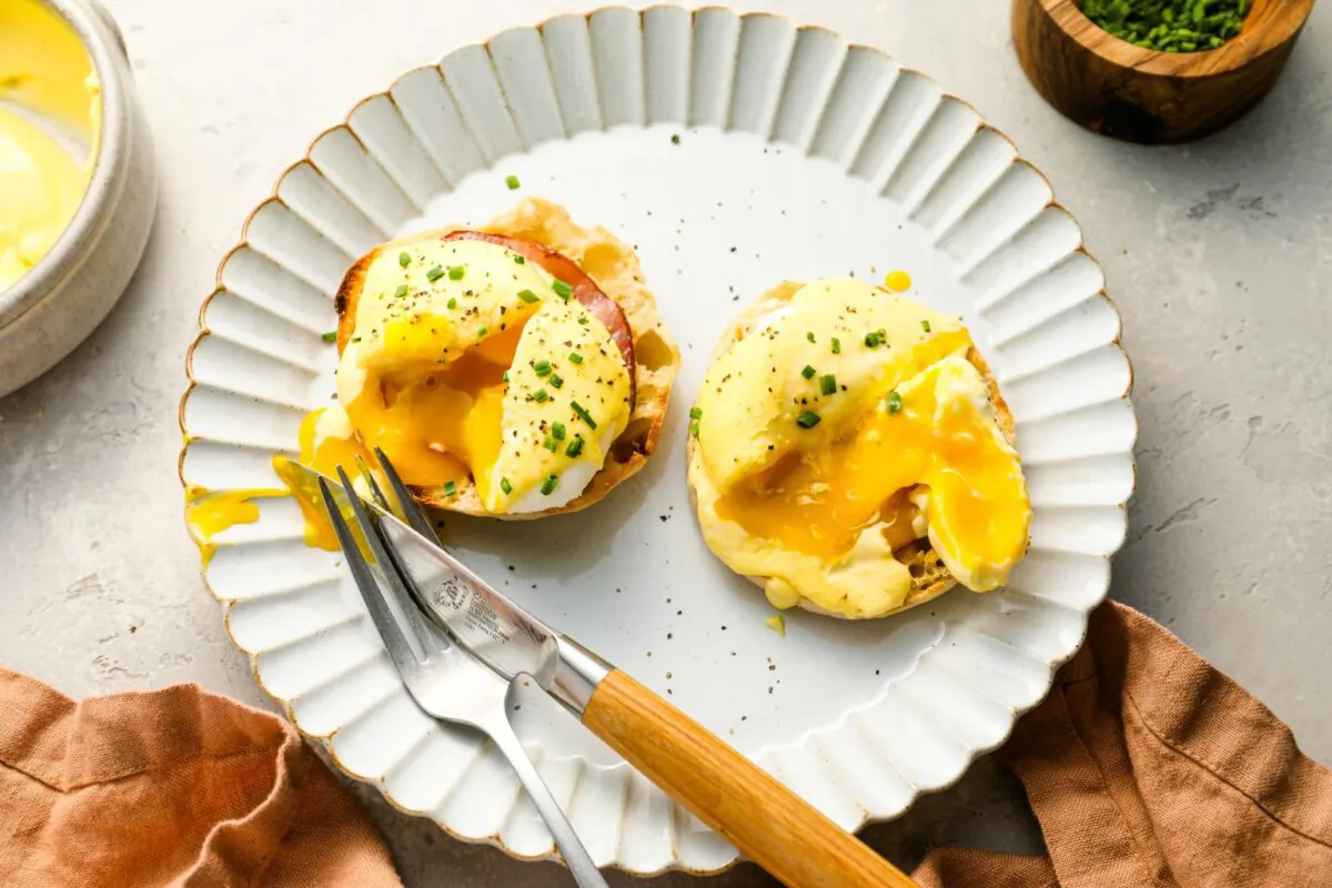 I’ll guide you through creating this brunch classic with toasted English muffins, perfectly poached eggs, creamy hollandaise, and crispy bacon. (Jennifer Segal)