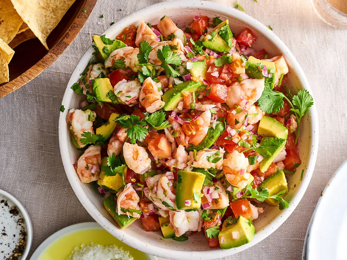 Made with poached shrimp marinated in citrus juice, tomato, avocado and cilantro, this is the perfect dish to make when it's too hot to cook. (Joe Lingeman/TNS)