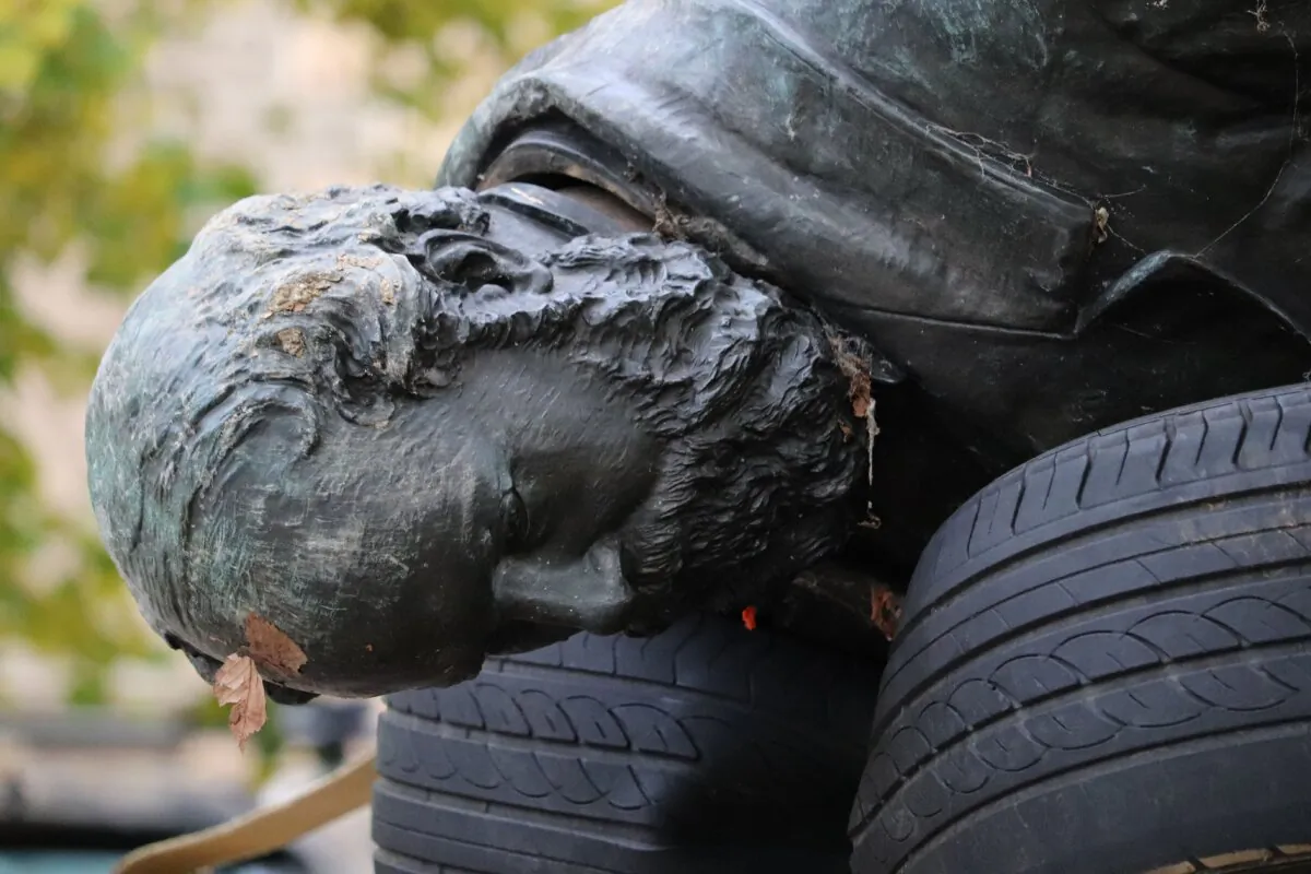 The statue of former Tasmanian premier William Crowther is seen after it was cut down by vandals at Franklin Square in Hobart, Australia, on May 15, 2024. (AAP Image/Ethan James)