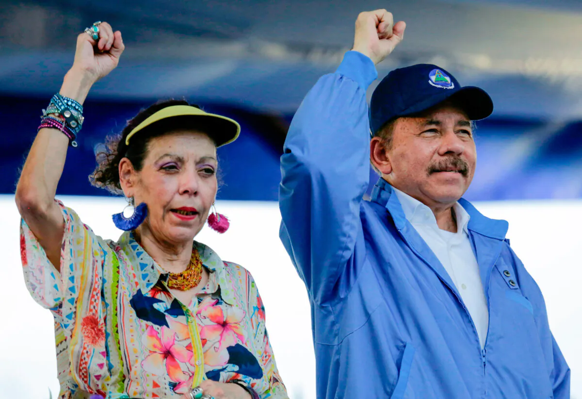 Nicaraguan President Daniel Ortega (R) and his wife, Vice President Rosario Murillo, during the commemoration of the 51st anniversary of the Pancasan guerrilla campaign, in Managua, Nicaragua, on Aug. 29, 2018. (Inti Ocon/AFP/Getty Images)