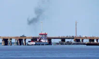 Barge Strikes Galveston Bridge, Causes Oil Spill and Structural Damage