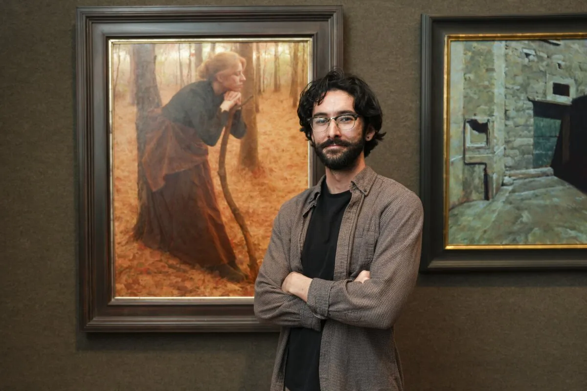 The Hartley Prize winner Alex J. Venezia stands next to his painting "Autumnal Hymn" at the reception of The Third Annual Hartley Invitational exhibition and sale at The Salmagundi in New York City on May 9, 2024. (Samira Bouaou/The Epoch Times)