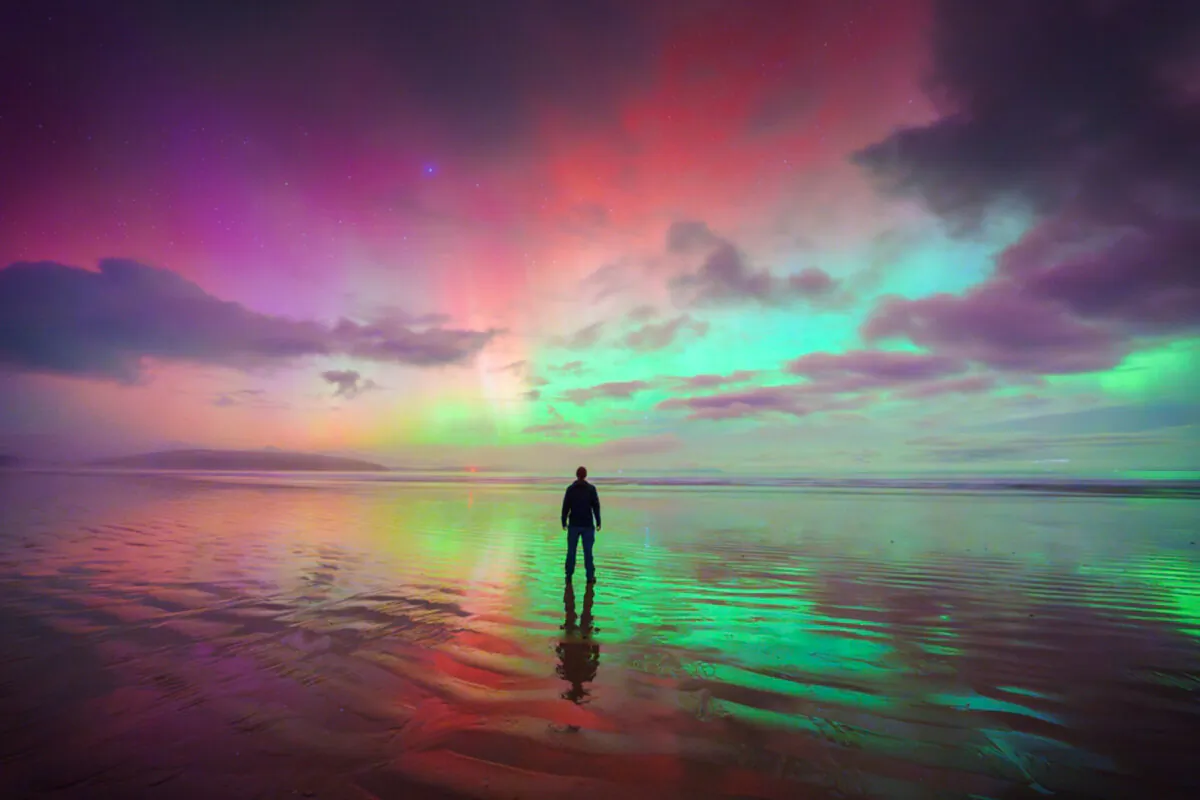 Mr. Tscharke photographs himself under the Aurora Australis on May 11. (Courtesy of Luke Tscharke)