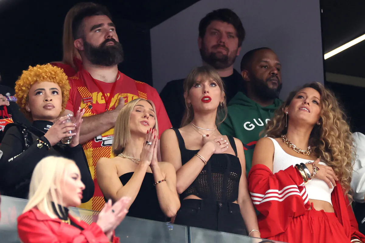 Rapper Ice Spice, NFL player Jason Kelce, singer Taylor Swift and actress Blake Lively react prior to Super Bowl LVIII between the San Francisco 49ers and Kansas City Chiefs at Allegiant Stadium in Las Vegas, Nev., on Feb.11, 2024. (Ezra Shaw/Getty Images)