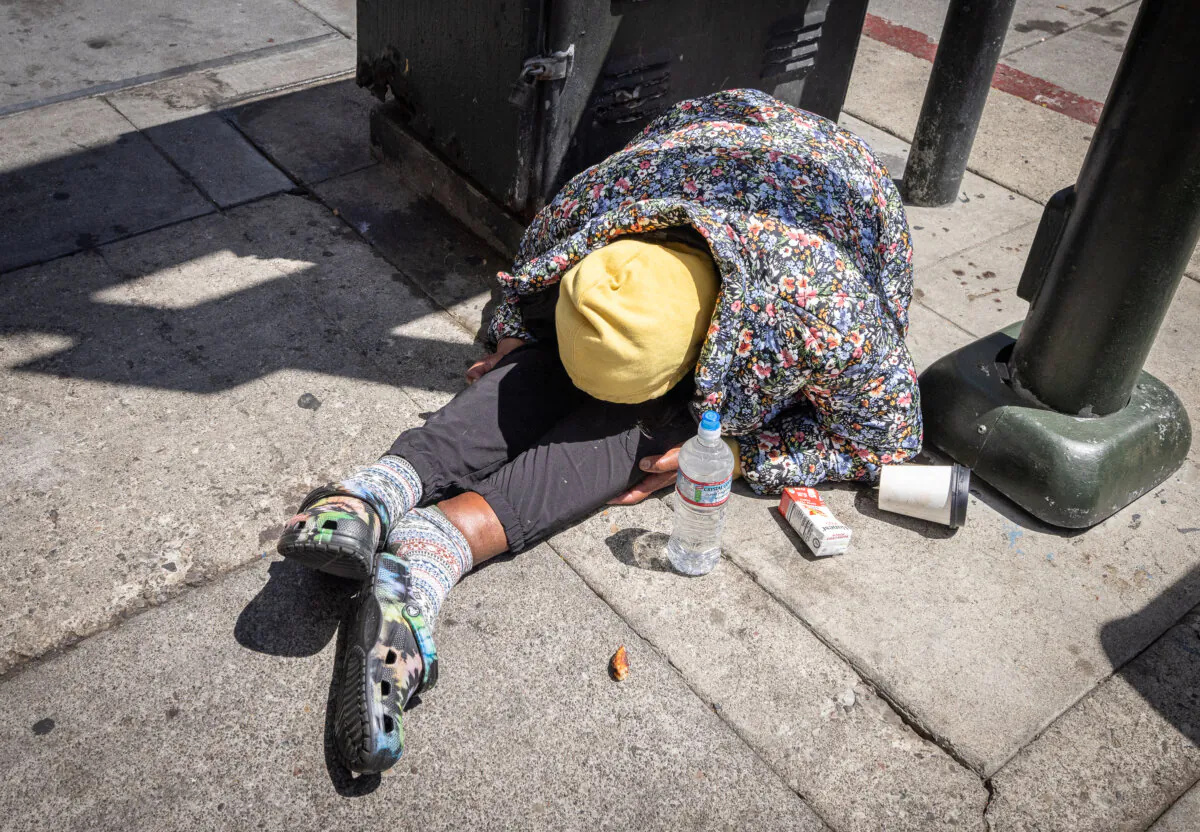 A person under the influence of drugs in the Tenderloin District of San Francisco on May 16, 2024. (John Fredricks/The Epoch Times)