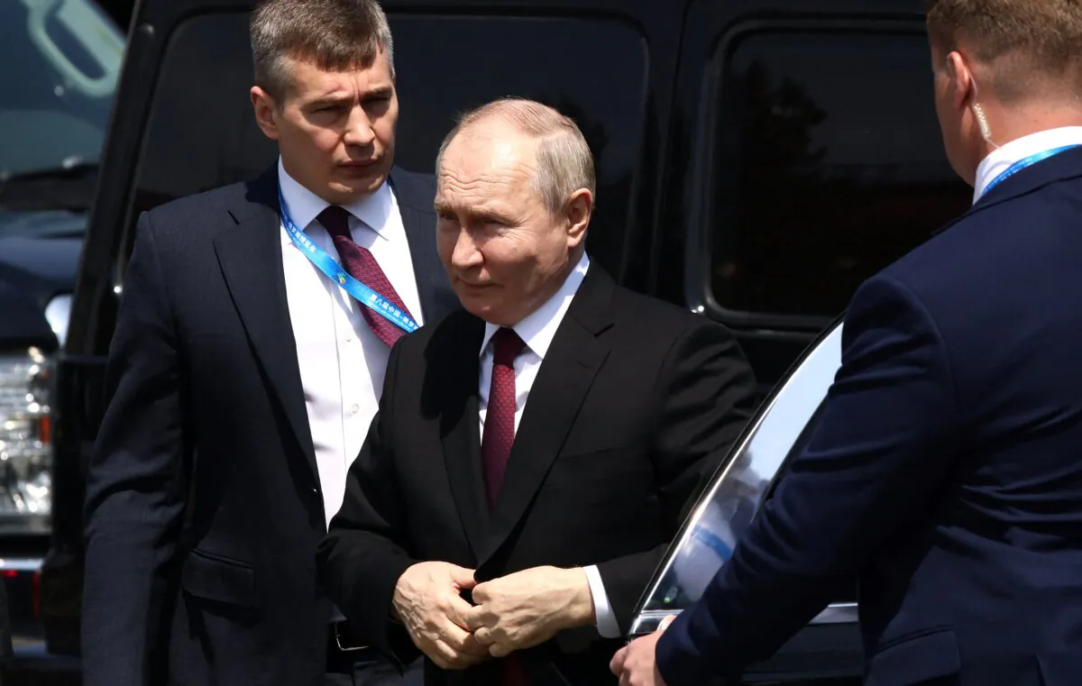 Russia's President Vladimir Putin gets off his car in Harbin, China, on May 17, 2024. (Alexander Ryumin/Pool/AFP via Getty Images)