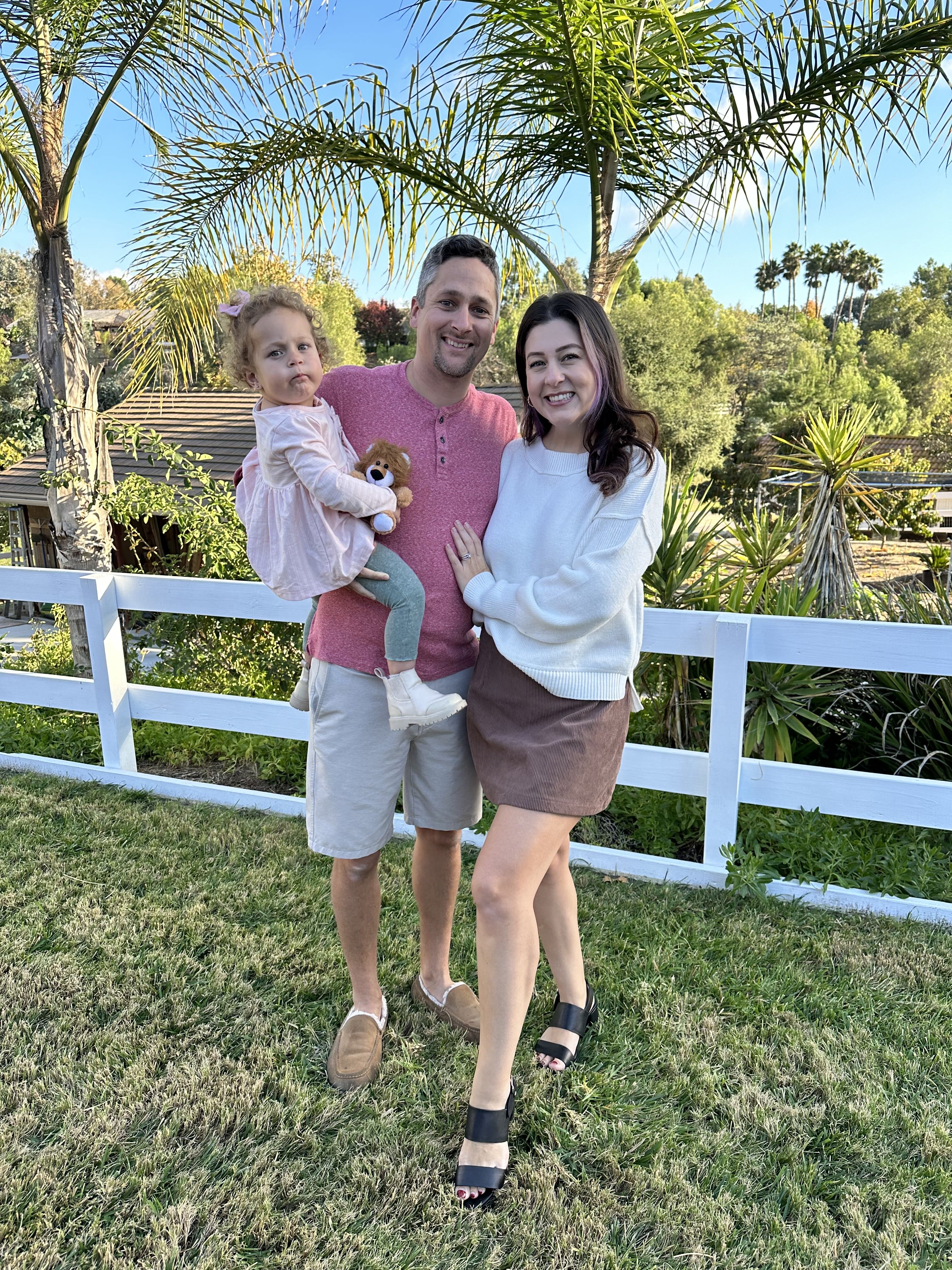 Penelope Kay with her parents.