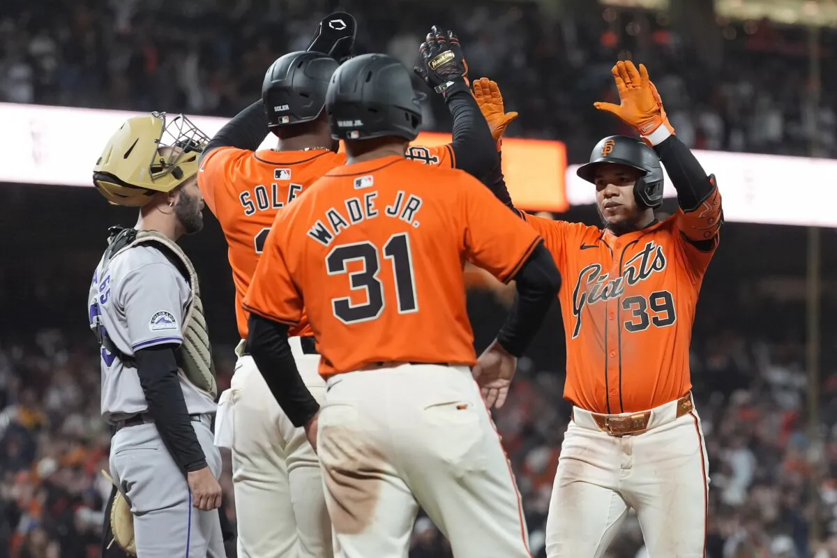 San Francisco Giants' Thairo Estrada (39) celebrates after hitting a three-run home run against the Colorado Rockies that scored LaMonte Wade Jr. (31) and Jorge Soler, second from left, during the fifth inning of a baseball game in San Francisco on May 17, 2024. (Jeff Chiu/AP Photo)