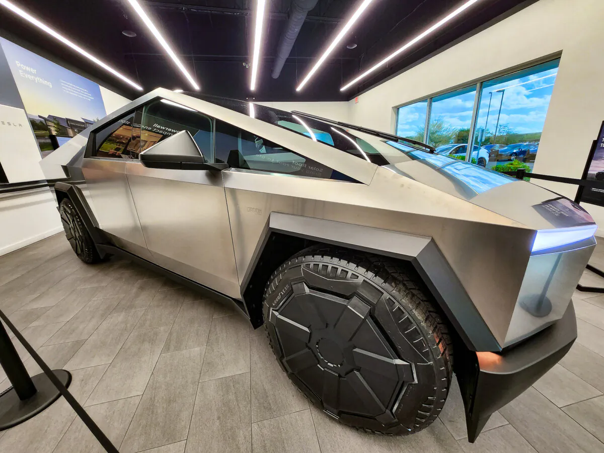A 2024 Tesla all-wheel-drive vehicle sits in the display room at a Tesla dealership in Phoenix, Ariz., on Feb. 1, 2024. (Allan Stein/The Epoch Times).