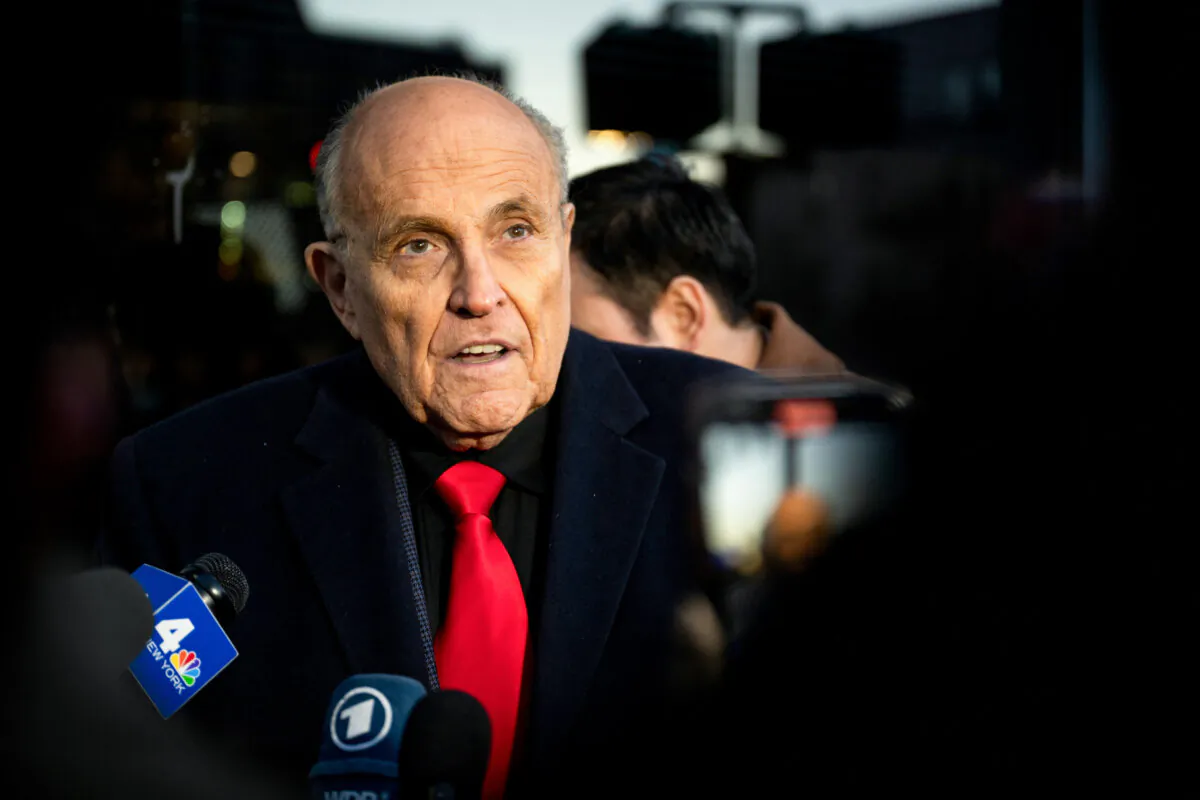 Rudy Giuliani speaks to members of the media in Manchester, N.H., on Jan. 21, 2024. (Brandon Bell/Getty Images)